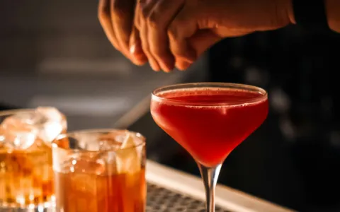 Bartenders-serving-American-whisky-cocktails-during-American-Craft-Cocktail-Week-at-a-premium-bar-in-Mumbai
