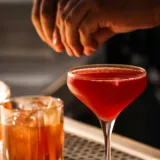 Bartenders-serving-American-whisky-cocktails-during-American-Craft-Cocktail-Week-at-a-premium-bar-in-Mumbai
