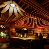 Interior-view-of-Flora-restaurant-at-Santana-Row-featuring-a-modern-indoor-outdoor-dining-space